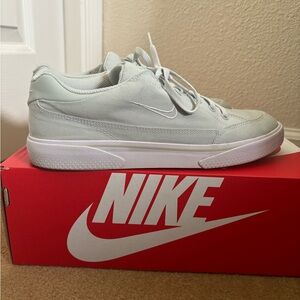 Green Nikes, women’s size 10